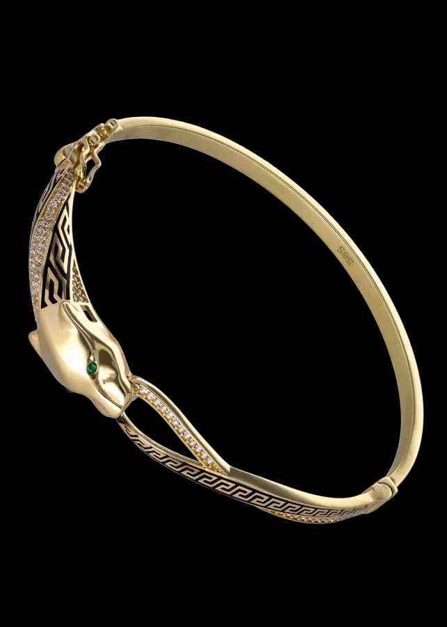 Pulsera brazalete con cabeza de pantera dorada, ojos verdes, diamantes y esmalte